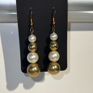 Gold and pearl stacked dangle earrings